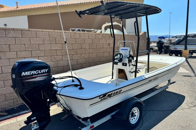 Slide: The Image of 2017 Mako Pro Skiff 17 CC boat with Mercury engine on trailer. - 5