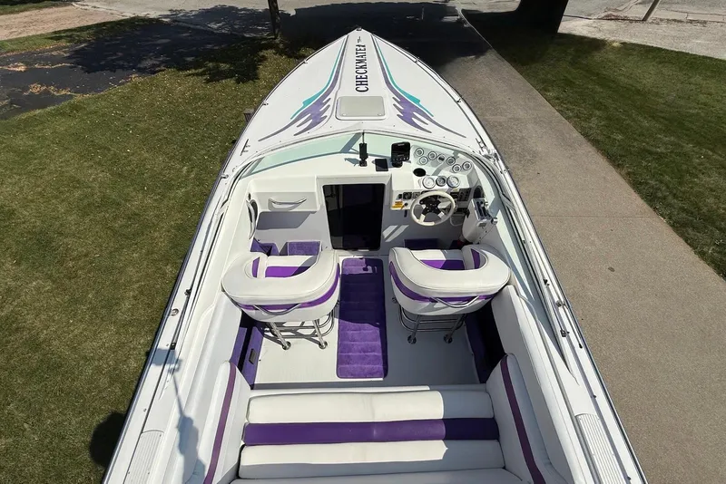 Slide: The Image of Overhead view of 1995 Checkmate Persuader 261 boat with white and purple interior. - 31
