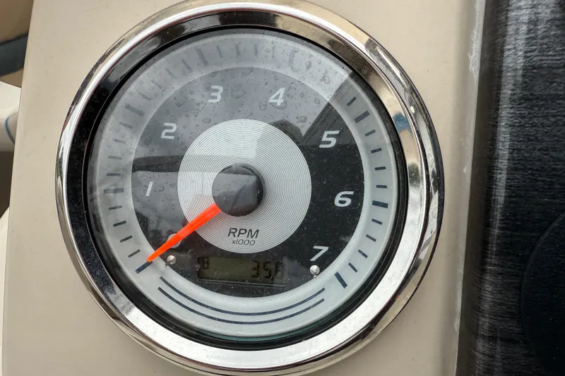 Slide: The Image of Close-up of Avalon Venture Cruise 2020 RPM gauge displaying 3.5 x 1000 RPM. - 22