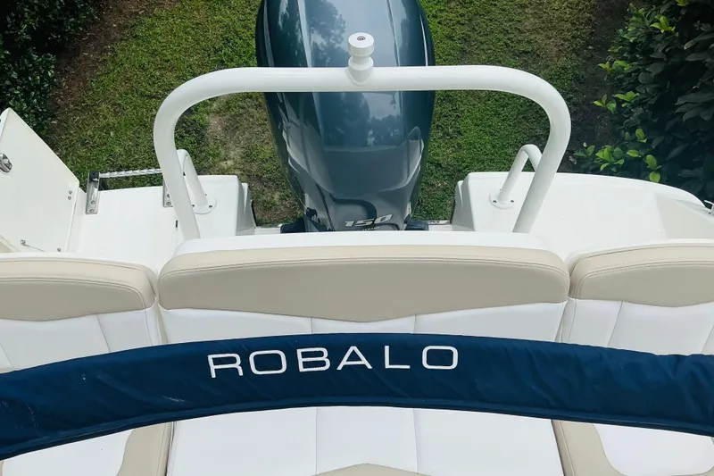 Slide: The Image of 2019 Robalo R207 Dual Console boat with Yamaha 150 engine, viewed from above. - 4