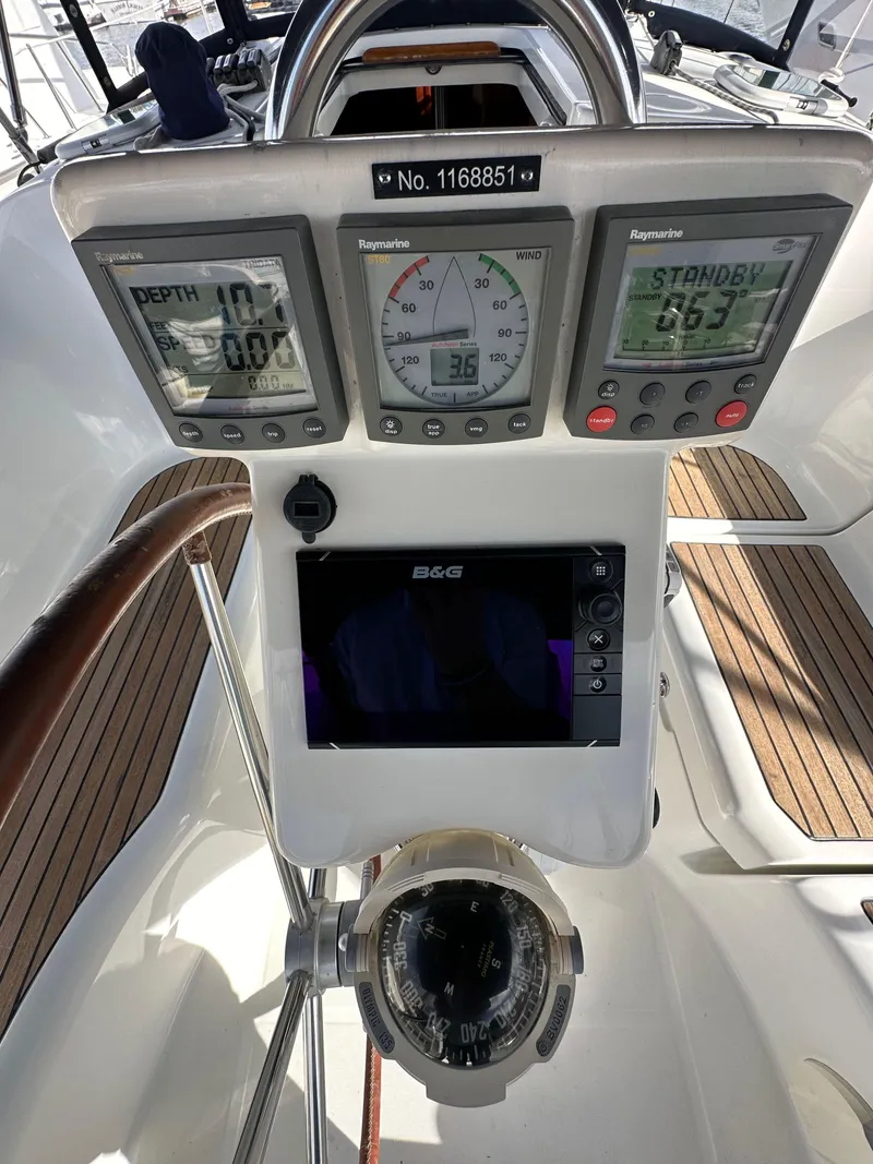 Slide: The Image of Beneteau 373 sailboat cockpit with navigation instruments, 2005 model. - 14