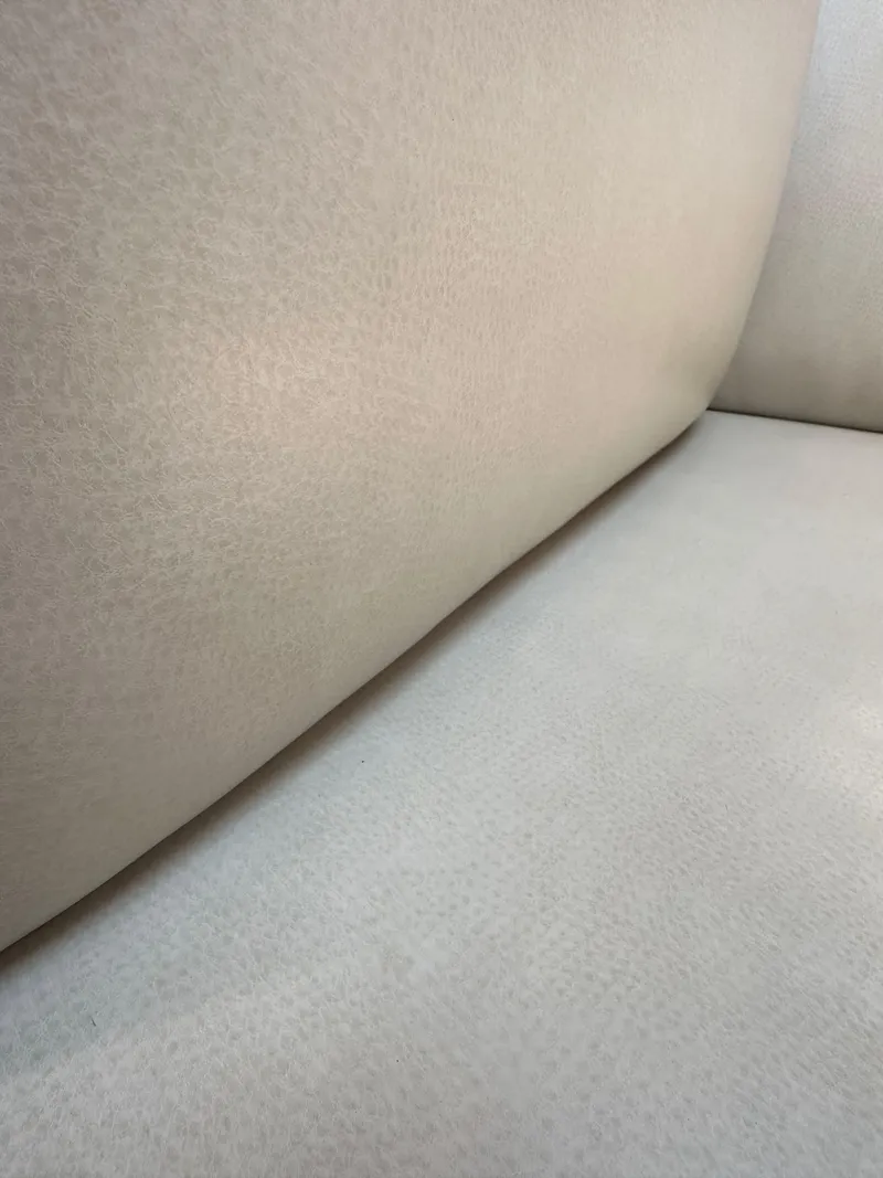 Slide: The Image of Beige upholstery detail in 2005 Beneteau 373 sailboat interior. - 44