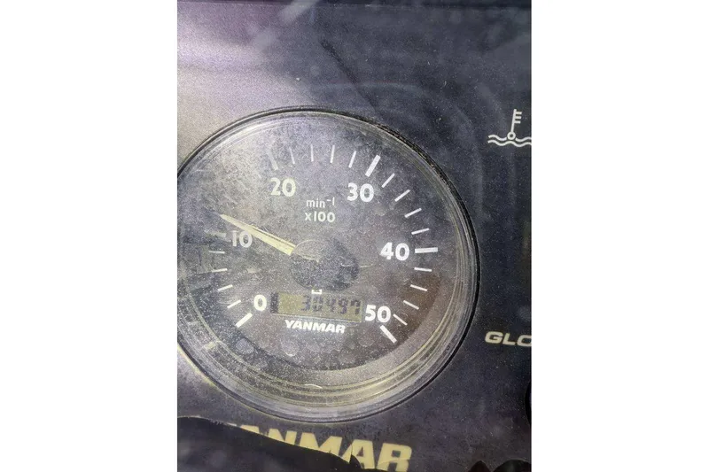 Slide: The Image of Close-up of a Yanmar tachometer on a 2005 Beneteau 373 sailboat. - 86
