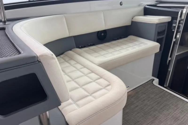 Slide: The Image of Luxurious seating area in a 2019 Cobalt A40 boat interior. - 4