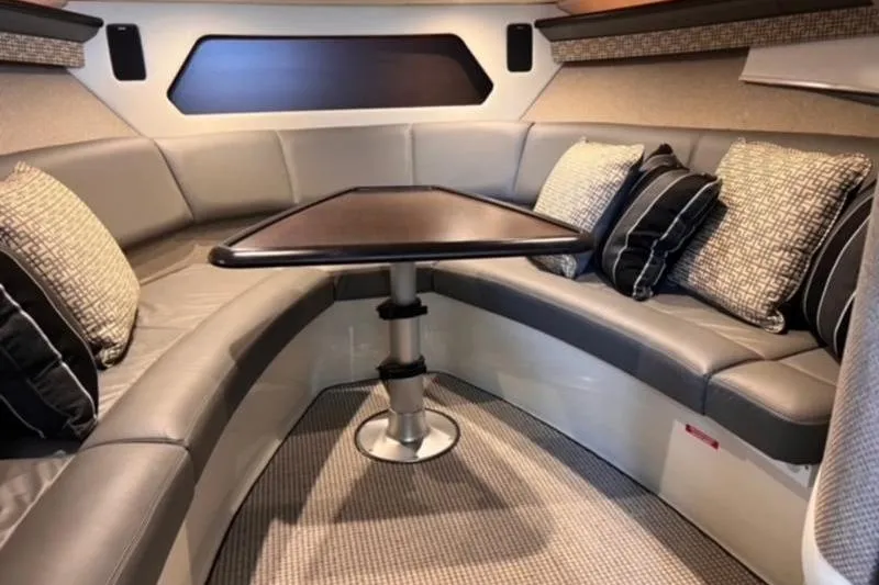 Slide: The Image of Luxurious interior of 2019 Cobalt A40 boat with plush seating and elegant table. - 7