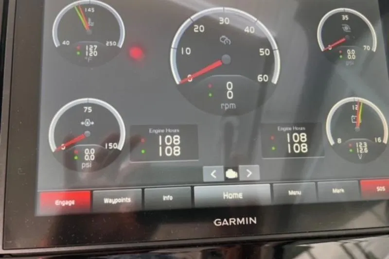 Slide: The Image of Garmin display showing engine metrics on a 2019 Cobalt A40 boat. - 8
