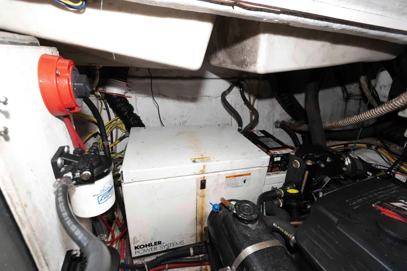 Slide: The Image of Engine compartment of a 2006 Maxum 3300 SE boat with Kohler power system. - 11