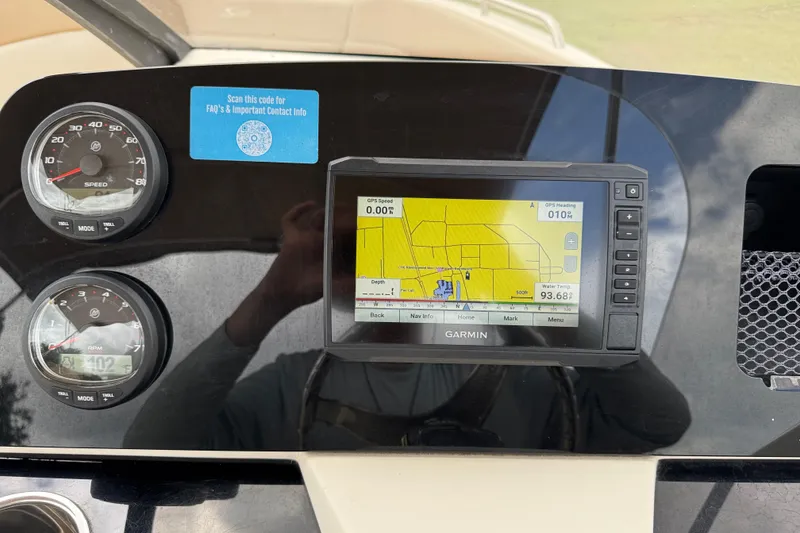 Slide: The Image of Dashboard of 2023 Scout 215 Dorado with Garmin GPS and speedometer. - 16