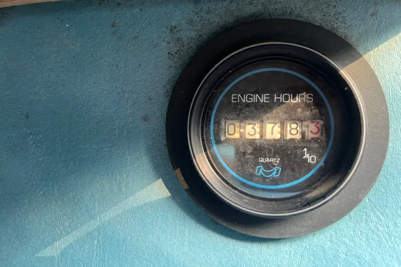 Slide: The Image of Engine hour meter showing 378.3 hours on 1983 Century 3000 Bowrider boat. - 16