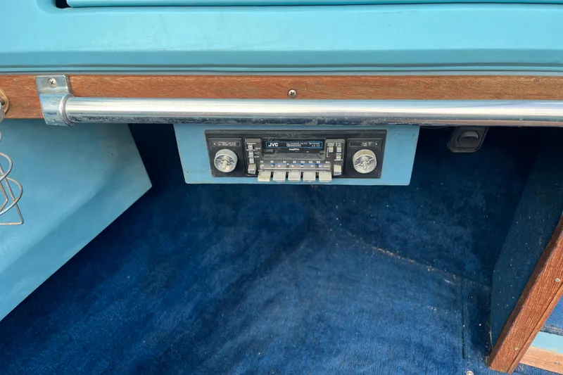 Slide: The Image of Vintage JVC stereo in 1983 Century 3000 Bowrider boat with blue interior. - 17