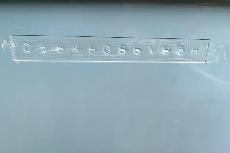 Slide: The Image of Hull identification number on 1983 Century 3000 Bowrider boat. - 27