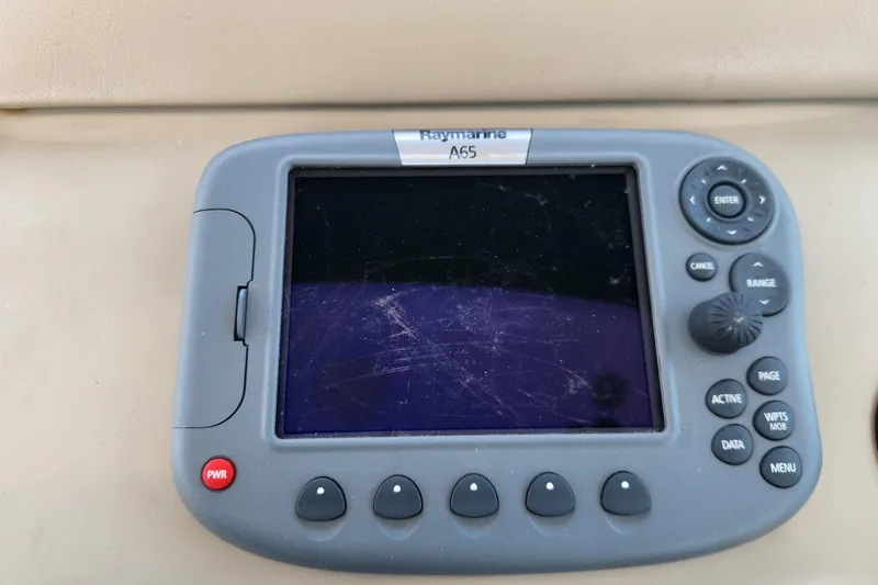 Slide: The Image of Raymarine A65 marine GPS unit on 1999 Sea Ray 310 Sundancer. - 11