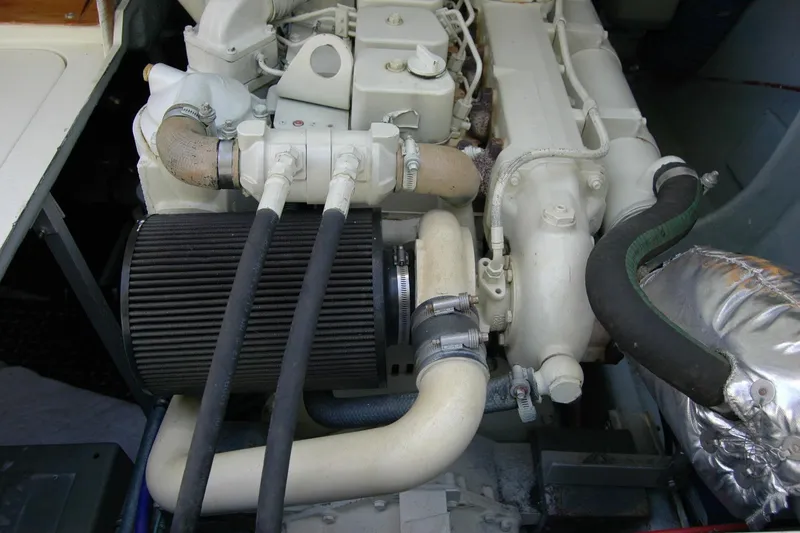 Slide: The Image of Engine compartment of a 1987 Bertram 33 Sport Fisherman boat. - 48