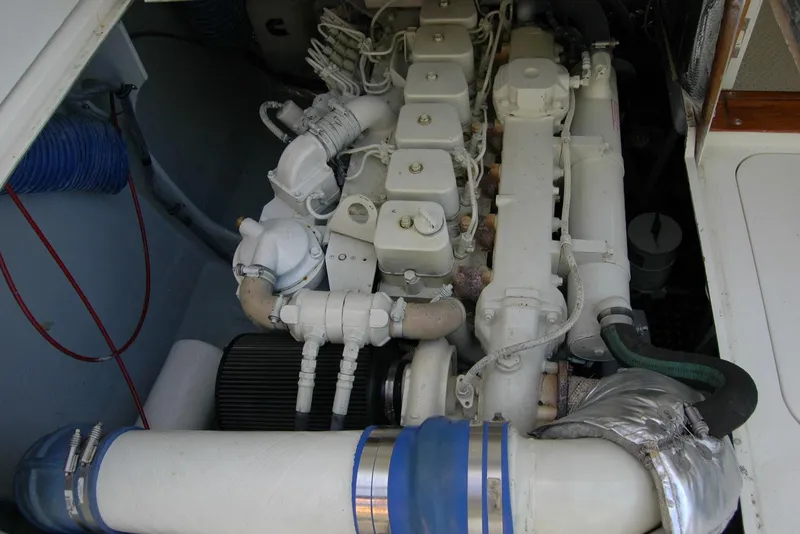 Slide: The Image of Engine compartment of a 1987 Bertram 33 Sport Fisherman boat. - 49