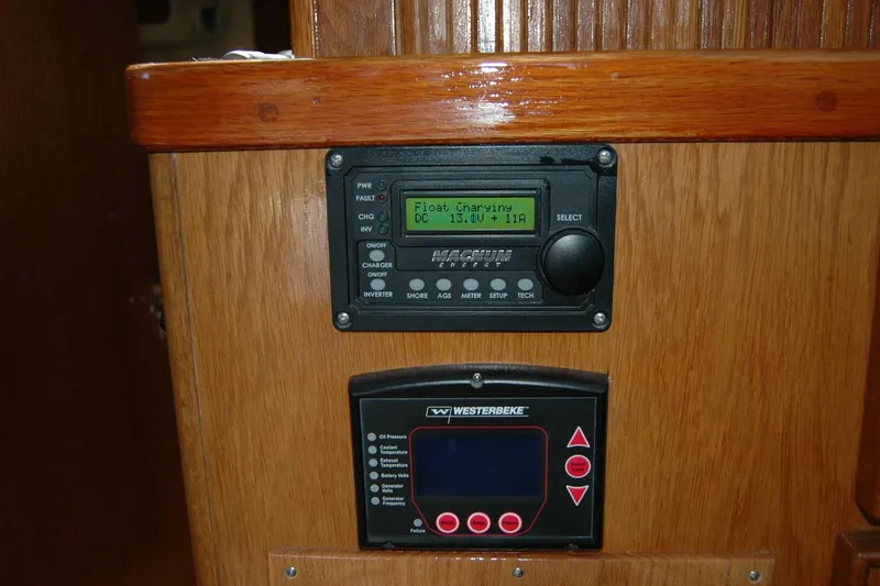 Slide: The Image of Control panels on a 1987 Bertram 33 Sport Fisherman boat interior. - 67