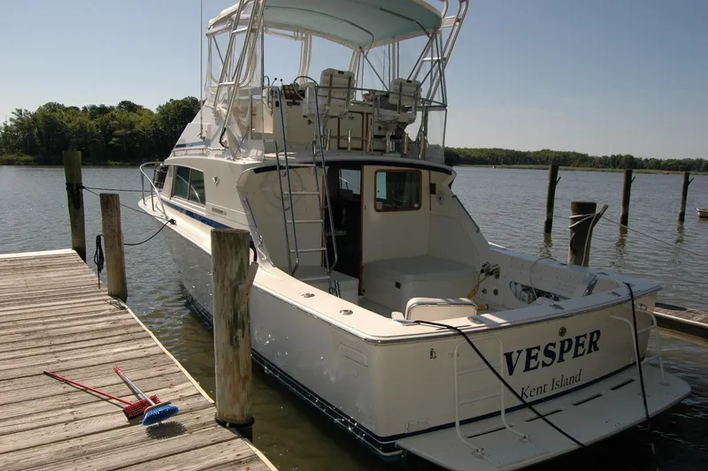 Slide: The Image of 1987 Bertram 33 Sport Fisherman docked at Kent Island marina. - 8