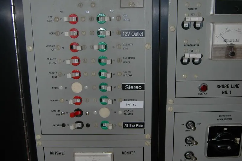 Slide: The Image of Electrical control panel on a 1987 Bertram 33 Sport Fisherman boat. - 85