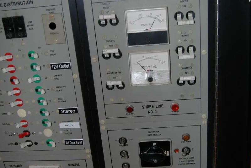 Slide: The Image of Electrical control panel on a 1987 Bertram 33 Sport Fisherman boat. - 86