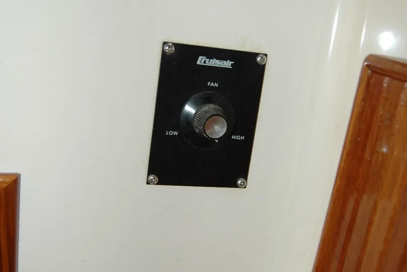 Slide: The Image of Cruisair fan control panel on 1987 Bertram 33 Sport Fisherman boat. - 89