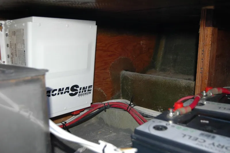Slide: The Image of Electrical components inside a 1987 Bertram 33 Sport Fisherman boat. - 98