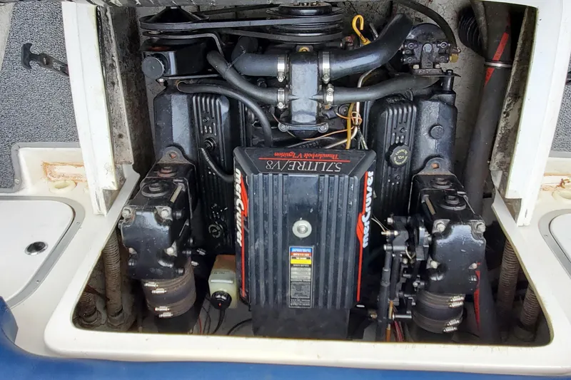 Slide: The Image of Engine compartment of a 1996 Bayliner 2252 Ciera Express boat. - 21