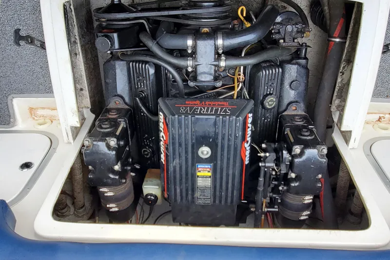 Slide: The Image of Engine compartment of a 1996 Bayliner 2252 Ciera Express with MerCruiser V8 engine. - 22