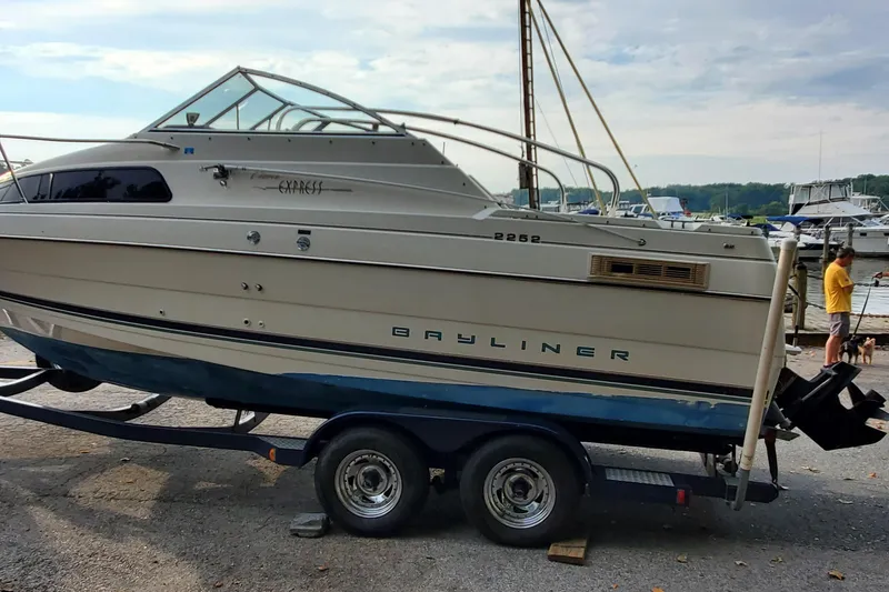 Slide: The Image of 1996 Bayliner 2252 Ciera Express boat on trailer at marina. - 5