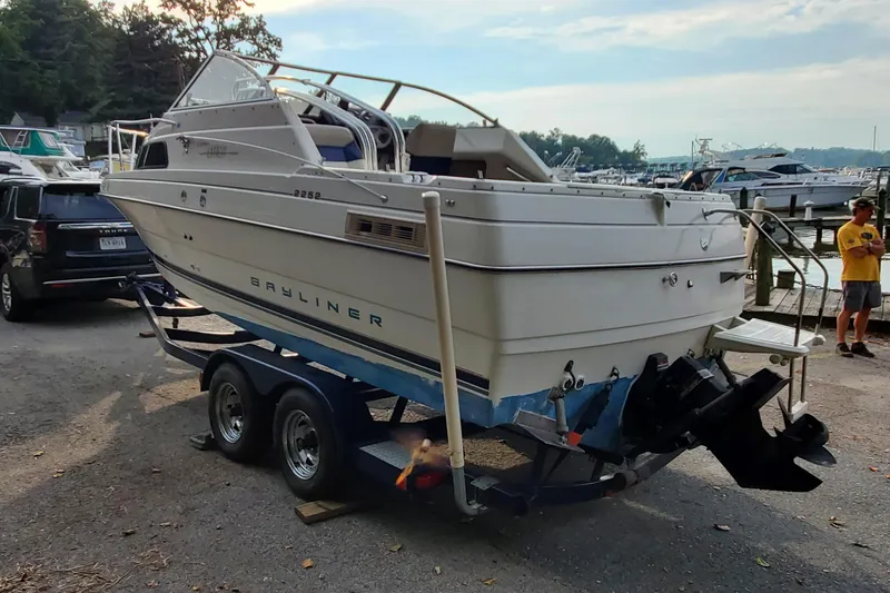 Slide: The Image of 1996 Bayliner 2252 Ciera Express on trailer at marina, ready for launch. - 7