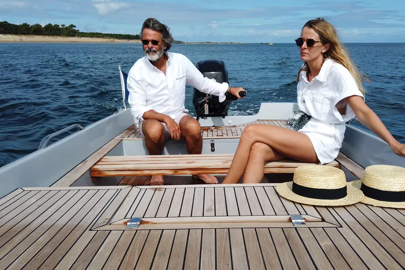 Slide: The Image of Couple enjoying a ride on a 2026 Black Pepper Tender 17 boat. - 10