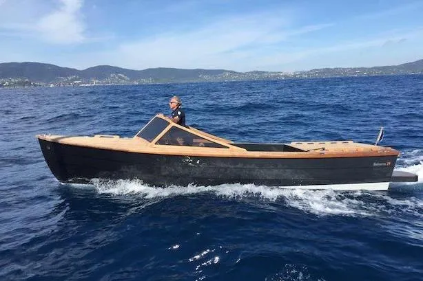 Slide: The Image of Black Pepper Tender 24 boat cruising on open sea, 2026 model. - 15