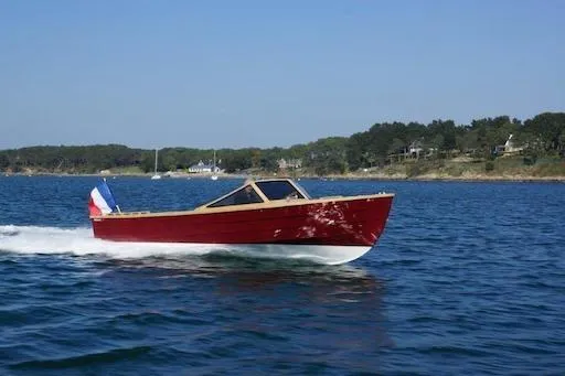 Slide: The Image of Red Black Pepper Tender 24 boat cruising on a sunny day, 2026 model. - 17