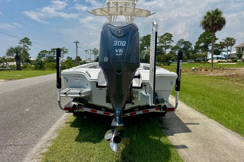 Slide: The Image of 2023 Pathfinder 2500 Hybrid boat with Yamaha 300 V6 engine on a trailer. - 6