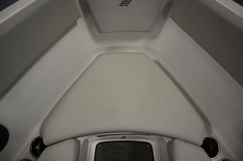 Slide: The Image of Interior seating of 2026 Four Winns H1 Freedom boat, featuring sleek design and cup holders. - 15
