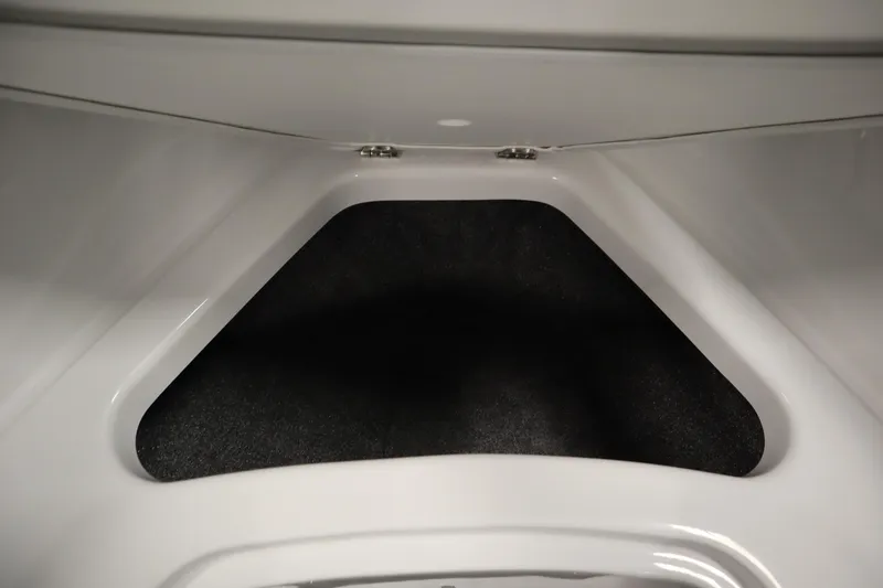 Slide: The Image of Interior storage compartment of 2026 Four Winns H1 Freedom boat. - 16
