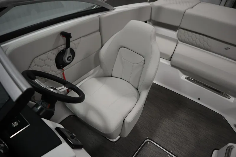 Slide: The Image of 2026 Four Winns H1 Freedom boat interior with sleek white seating and modern design. - 30