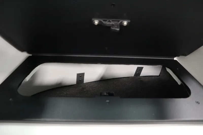 Slide: The Image of Storage compartment of 2026 Four Winns H1 Freedom boat, open and empty. - 35