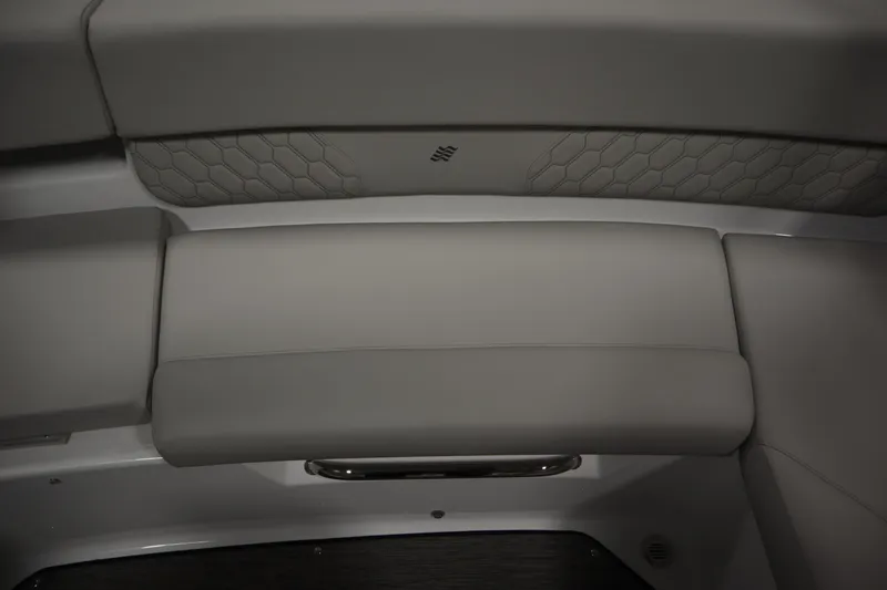 Slide: The Image of 2026 Four Winns H1 Freedom boat interior seating with hexagonal pattern design. - 42