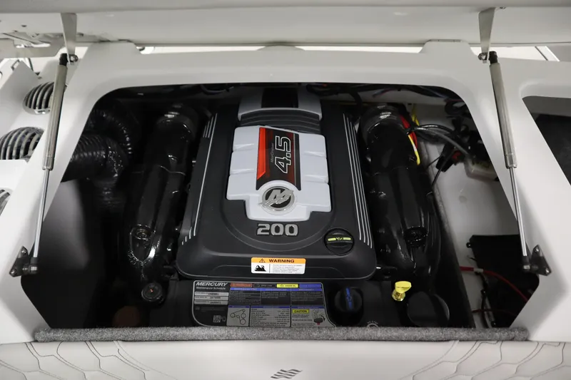 Slide: The Image of 2026 Four Winns H1 Freedom engine compartment with Mercury 4.5L 200 horsepower engine. - 46