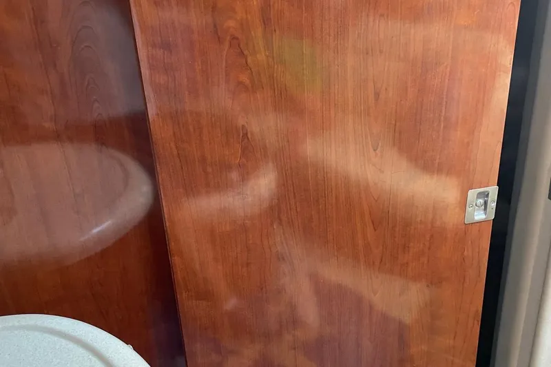 Slide: The Image of Wooden interior door of 2004 Sea Ray 420 Sundancer yacht. - 24