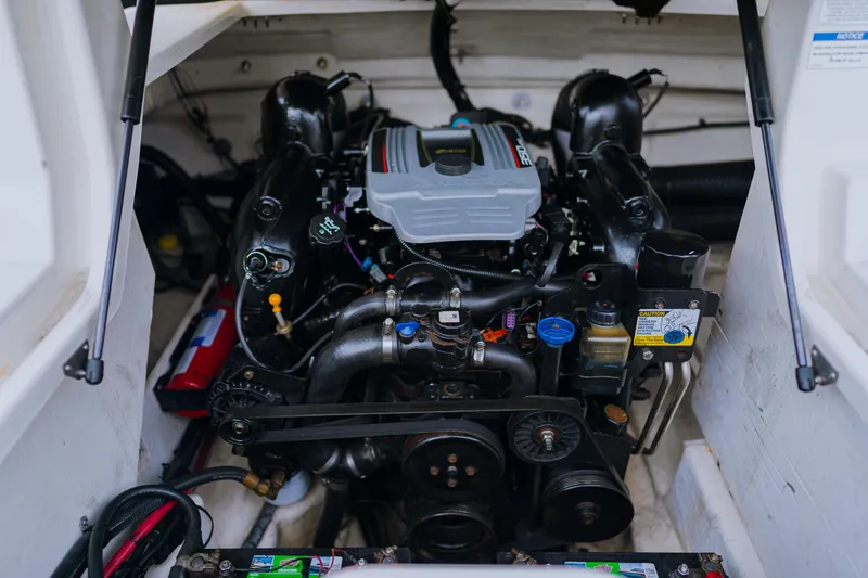 Slide: The Image of Engine compartment of a 2013 Sea Ray 220 Sundeck boat. - 7