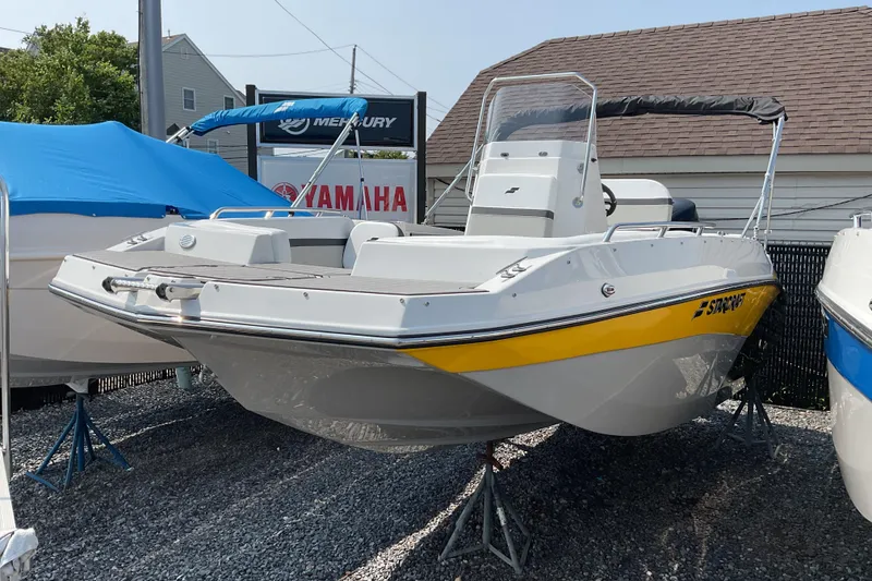 The Image of 2025 Starcraft SVX 191 OB CC boat displayed outdoors, featuring a sleek design. - 0
