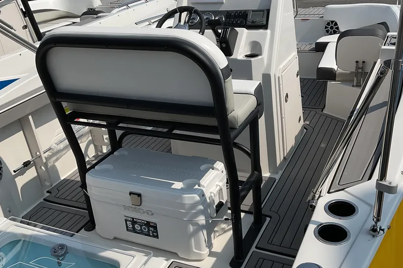 Slide: The Image of 2025 Starcraft SVX 191 OB CC boat interior with seating and cooler. - 3
