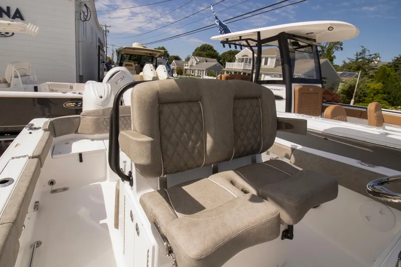 Slide: The Image of 2026 Sea Hunt Ultra 265 SE boat with luxurious seating and modern design. - 5