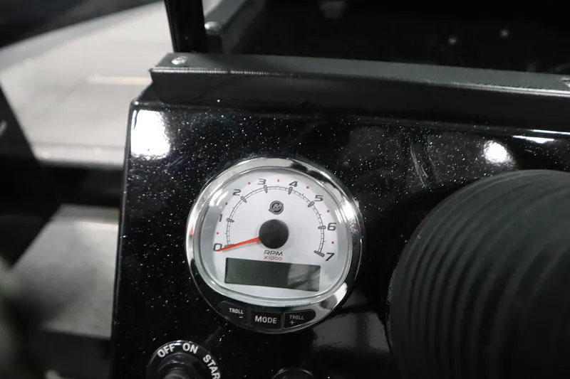 Slide: The Image of Tachometer on 2026 Crestliner 2050 Commander boat dashboard, showing RPM gauge. - 17