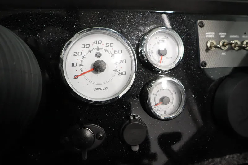 Slide: The Image of Dashboard of 2026 Crestliner 2050 Commander with speedometer and gauges. - 18