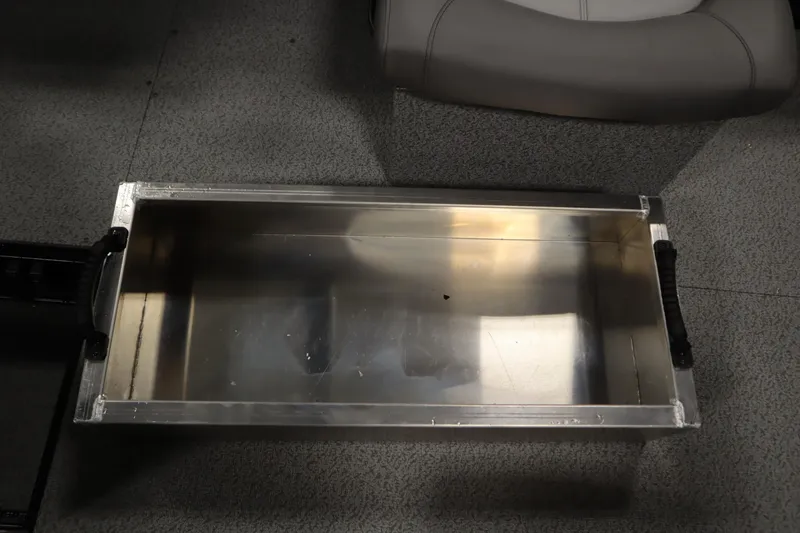 Slide: The Image of Aluminum storage compartment in 2026 Crestliner 2050 Commander boat interior. - 28
