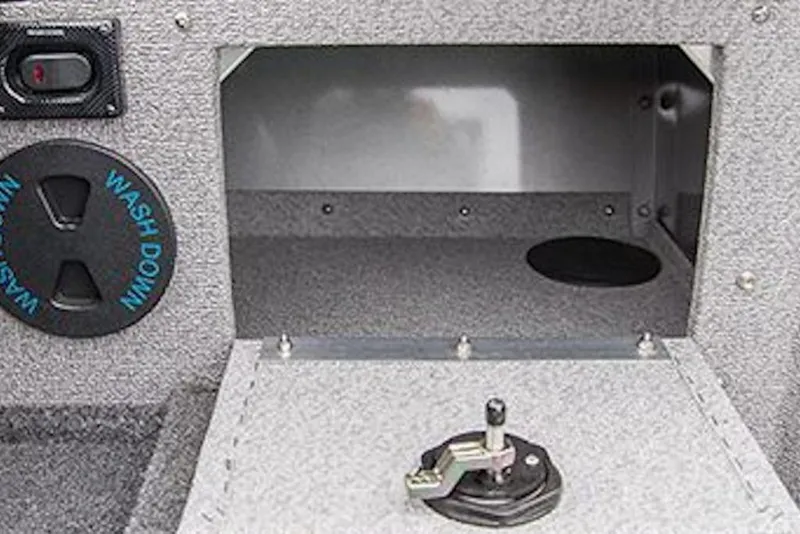Slide: The Image of Storage compartment in 2026 Crestliner 2050 Commander boat with washdown feature. - 53