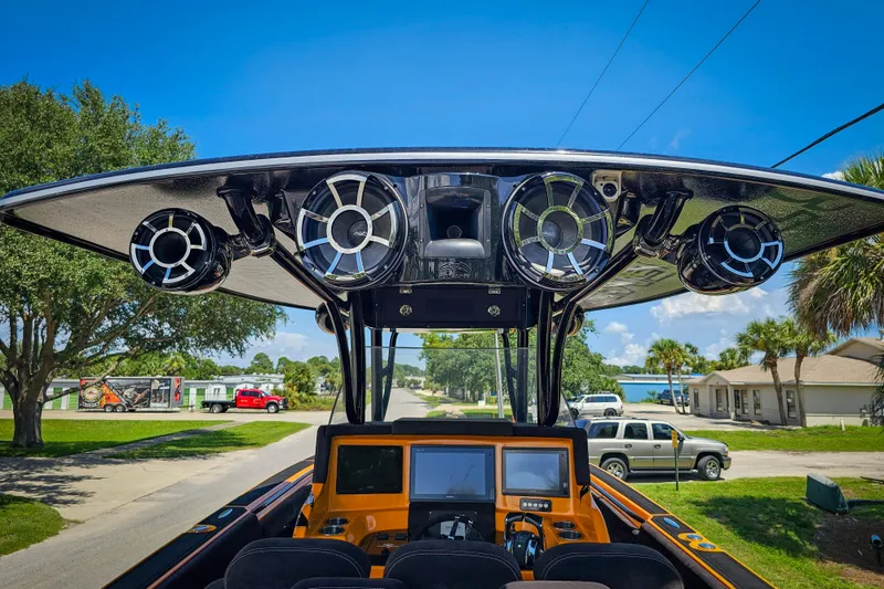 Slide: The Image of 2016 Statement 380 Open boat with advanced audio system and navigation screens. - 16