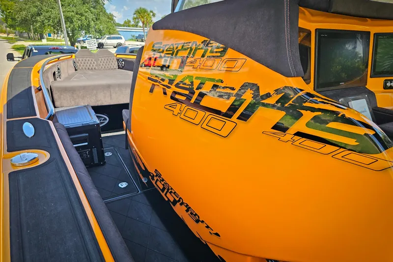 Slide: The Image of Orange 2016 Statement 380 Open boat interior with custom graphics and seating. - 18