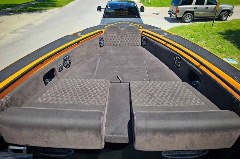 Slide: The Image of Luxurious interior of 2016 Statement 380 Open boat with plush seating and speakers. - 19